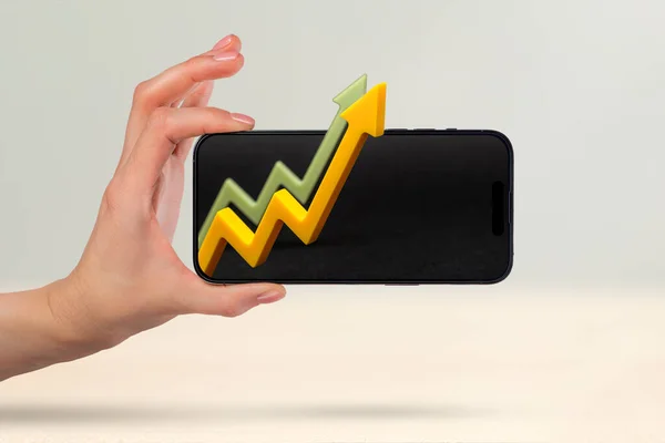 Financial market, purchase of shares, annual or quarterly reports of companies. Forecast of growth in the financial market. Phone in hand, financial graph and growth chart on phone screen.