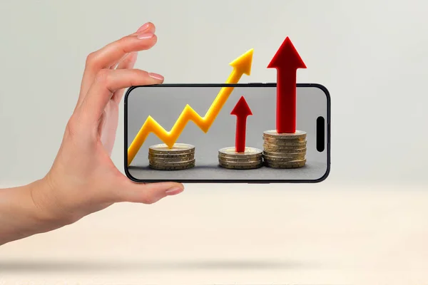 Financial market, purchase of shares, annual or quarterly reports of companies. Forecast of growth in the financial market. Phone in hand, financial graph and growth chart on phone screen.