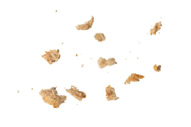 Beyaz arka planda izole edilmiş taze tahıllı ekmek kırıntıları. Tasarım ya da projeye eklemek için farklı boyutlardaki kırıntıları ayır. Yüksek kalite fotoğraf