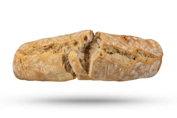 在一个白色孤立的背景下 一块意大利新鲜的Ciabatta面包被分成两个部分 面包挂在或落在白色的背景上 意大利面包 顶视图 — 图库照片