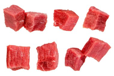 Pieces of raw beef. Set of fresh beef cubes isolated on white background. Isolate of beef cubes to insert into a design, project or for an advertising banner. High quality photo clipart