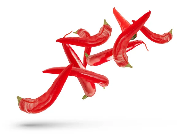Schoten Roter Paprika Verschiedenen Größen Und Formen Fallen Auf Einen — Stockfoto