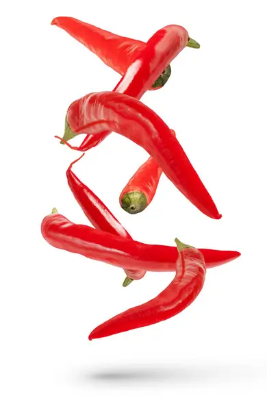Schoten Roter Paprika Verschiedenen Größen Und Formen Fallen Auf Einen — Stockfoto