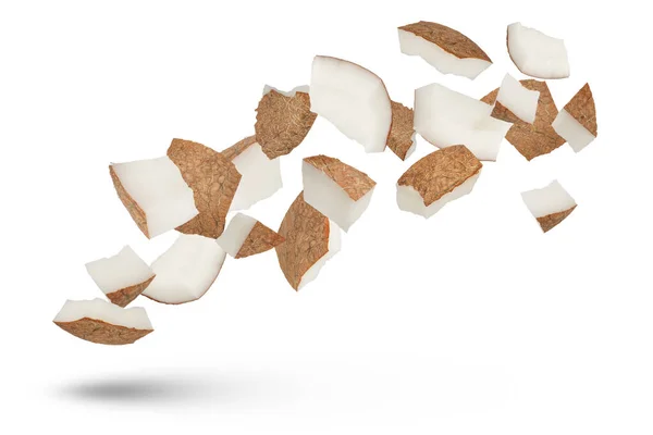 Kokosové Řezy Bílém Izolovaném Pozadí Kokosové Plátky Krustou Létají Různými — Stock fotografie