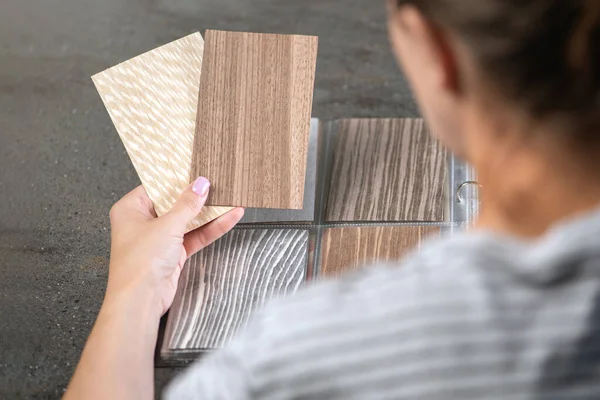 Woman Holds Samples Different Shades Floor Her Hands Chooses Designer — Stock Photo, Image