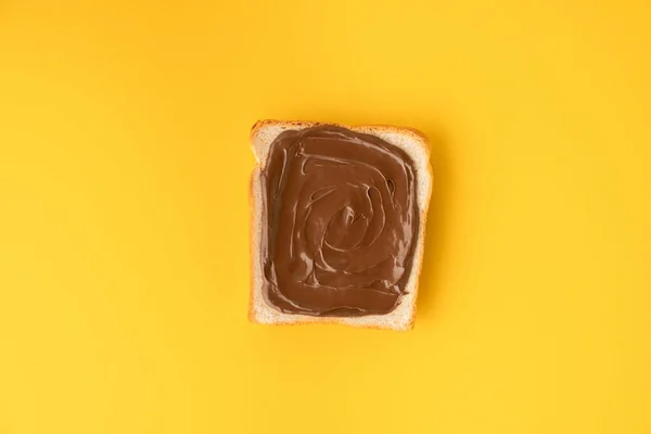 Top View White Toast Bread Chocolate Hazelnut Spread Yellow Background — Stock Photo, Image
