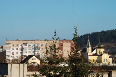 The view from the window to the city. Church on the outskirts.Church of the Holy Martyr Tatiana.New church