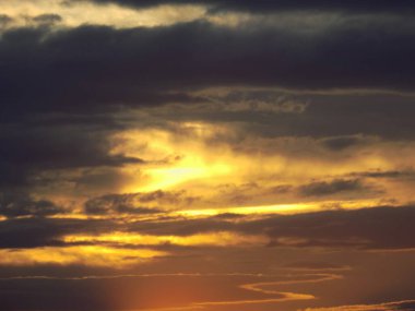 Evening cloudy sky, sunset