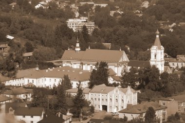 The historic part of the old town.Monasheskyy building Epiphany Monastery.Great old orthodox church clipart