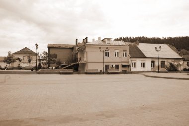 Old city street.The historic part of the old town.A small street of the old town.New square of the old town clipart