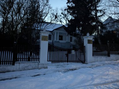 Wooden house in the Ukrainian village.Village on the edge of the forest  clipart