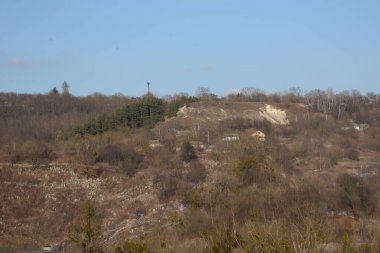 Wooden house in the Ukrainian village.On the outskirts of the village.Surroundings, outside the city.The grandeur of the Carpathian Mountains and forests