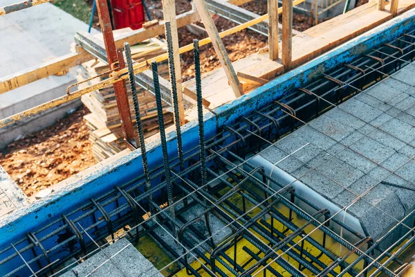 View of construction site with reinforced concrete slab. Concrete slab with reinforncing bars