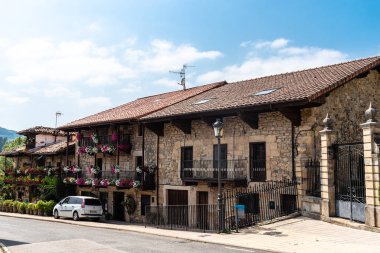 Villacarriedo, Spain - August, 12, 2022: Traditional houses renovated in the picturesque village of Sonanes