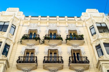Madrid, Spain - October 11, 2020: Old residential building with iron balconies in the downtown of Madrid.