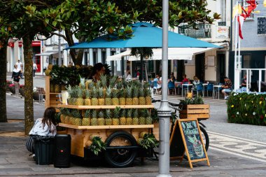 Ponta Delgada, Portugal - July 9, 2023: Pineapple street stall in the old town. Sao Miguel Island, Azores