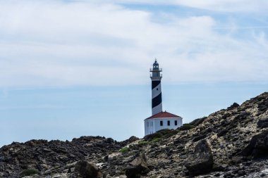 Favaritx, İspanya - 12 Mayıs 2024: Menorca 'daki Favaritx Deniz Feneri.