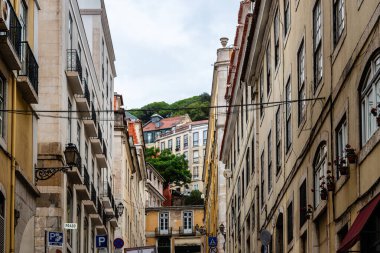 Lisbon, Portugal - October 29, 2022: Picturesque buildings in the Alfama district of Lisbon, Portugal, showcasing traditional architecture.