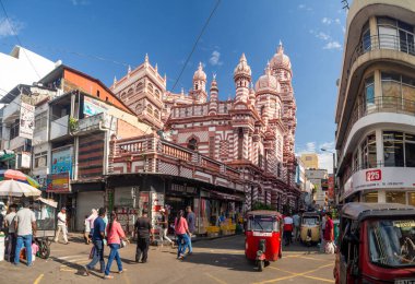 Colombo city, Sri Lanka, Ceylon island - Jami Ul-Alfar Mosque and busy street market clipart