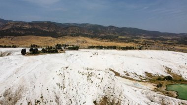 Pamukkale travertine terraces and the ancient Greek city of Hierapolis, Turkey clipart