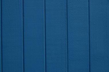 Mavi renkli ahşap tahtalar, ahşap panel duvarlara yakın plan.