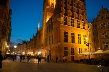 Scenic summer evening panorama of the architectural evening street of the Old Town GDANSK, POLAND - July 6, 2022