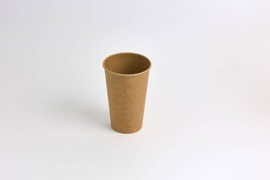 This double-walled paper cup is designed to keep hot beverages at the perfect temperature while preventing heat transfer to the hand clipart