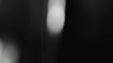 Real light leaks overlay flashing in black background