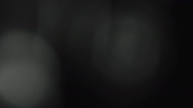 Real light leaks overlay flashing in black background