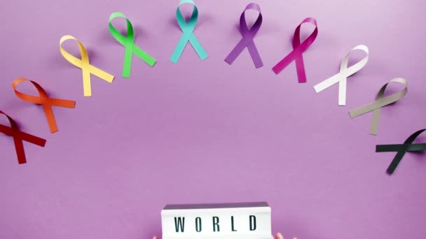 Bow Symbol World Cancer Day Background Overhead View — Stock Video