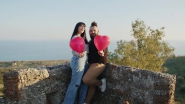 Couple enjoy the valentines day in the castle outdoor.