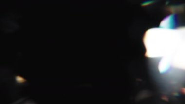 Real light leaks overlay flashing in black background