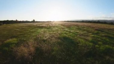 Aerial of an empty landscape countryside at sunset time