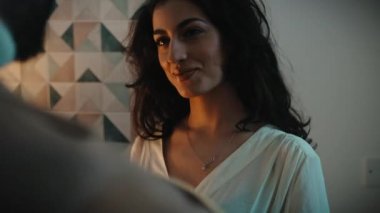 Girl Smile and dance In Kitchen With Her Boyfriend.