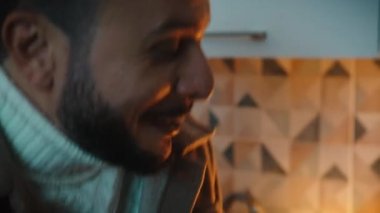 Boy Sing To Her Girlfriend At Valentines day in the kitchen