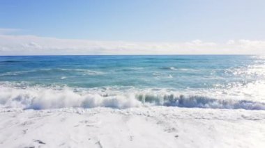 Stormy Waves of ocean in a windy daylight aerial view
