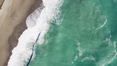 Stormy Waves of ocean in a windy daylight aerial view