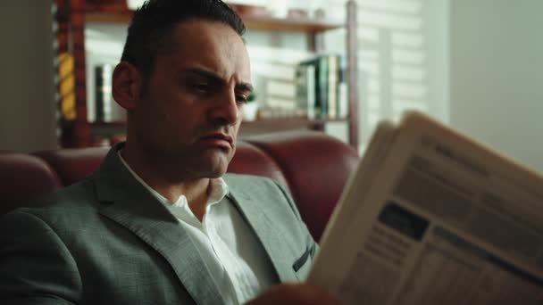 Businessman Reading Attention Newspaper Sofa — Stock Video