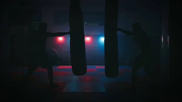 Silhouettes Athletes Punching Bags — Stock Photo, Image