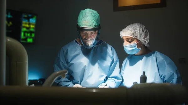 Doctors in the operating room Kidney Surgical Operation.