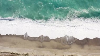 Stormy Waves of ocean in a windy daylight aerial view