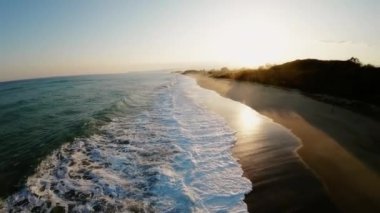 Mediterranean rough sea aerial view in Italy state during the sunset sky in March.