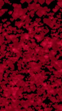 Sevgililer Günü için Kırmızı Kalpler Kalkıyor ve Siyah Arkaplanda Parıldıyor.