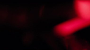 Real light leaks effects on black background.