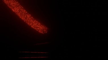 Light particles move along a loop-shaped path, a sign for infinity is displayed, the particles change color. Sci-fi animation on a black background. Motion graphics in 4k resolution