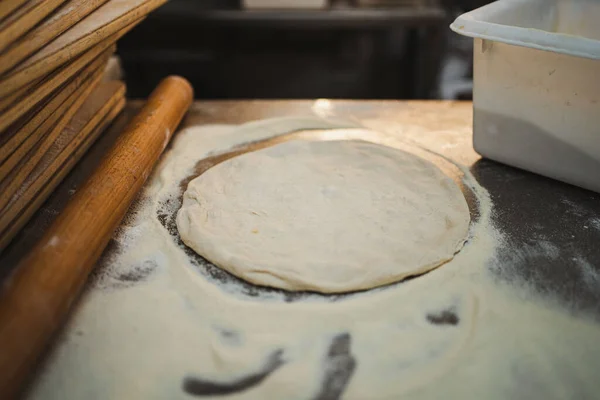 Uncooked Pizza Dough Surrounded Flour Kitchen Table Artisan Bakery — Stock Photo, Image