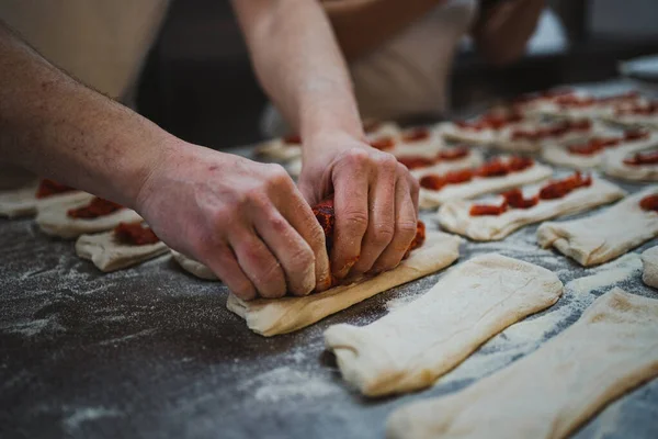 Baker Man Putting Chorizo Meat Bread Dough Make Stuffed Bread — Stock Photo, Image