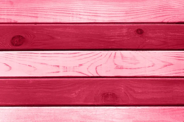 stock image Light red wood plank wall texture background. Demonstrating Viva Magenta - trendy color of the year 2023