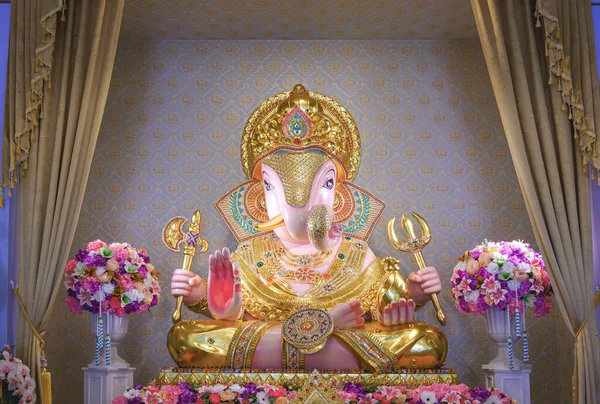 stock image Beautiful Lord Ganesha Dagadusheth statue enshrined in a Hindu temple