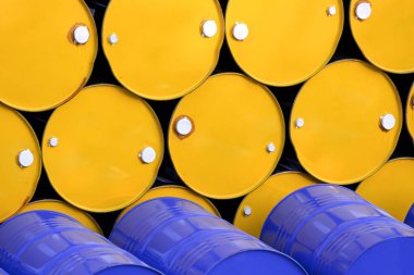 Stack of yellow and blue 200 liter oil drums group for industrial background concept clipart